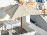 Alternatywne osłony przeciwsłoneczne na zewnątrz - przewodnik po wyborze, instalacji i pielęgnacji parasoli tarasowych